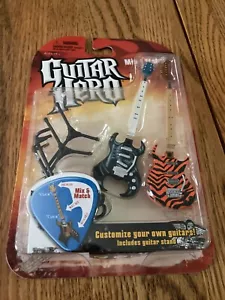Mini dúos Guitar Hero Mix & Match Máquina de retroalimentación y rayas de tigre Frydaze - Imagen 1 de 6