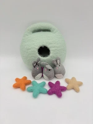 Lovevery Bunnies in a felt burrow green pouch Babbler Learning Transfer Stars - Image 1 of 4