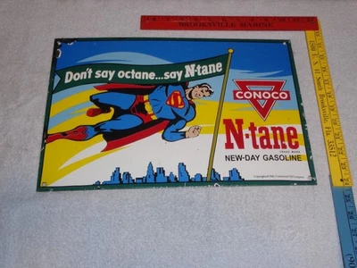 ВИНТАЖНЫЙ ФАРФОРОВЫЙ МЕТАЛЛИЧЕСКИЙ ЗНАК КОМИКСОВ 1946 CONOCO N-TANE SUPERMAN PETROL 16 ДЮЙМОВ - Изображение 1 из 4