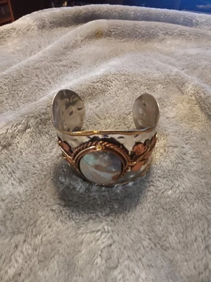 Silver tone,gold tone and copper cuff bracelet,polished stone center. - Image 1 of 4