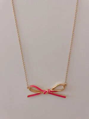 Collar colgante con lazo rosa Kate Spade, nuevo sin etiquetas $78 Foto 1 de 4
