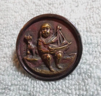 Vintage Antique Metal Picture Button BOY DOG & TOY SAILBOAT - Image 1 of 4