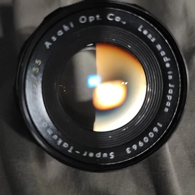 Lente óptica M42 Asahi de vidrio extremadamente limpio Pentax Super Takumar 55 mm f/2 Japón  Foto 1 de 4