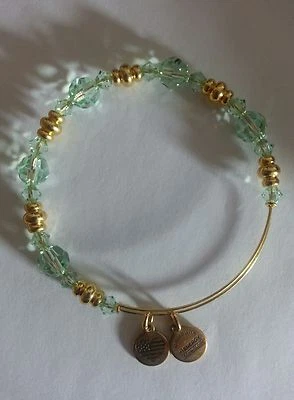 ALEX and ANI Green and GOLD VINTAGE SWAROVSKI CRYSTAL Bangle Bracelet  - Image 1 of 4