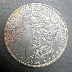 1904-O MORGAN SILVER DOLLAR ~ LIGHTLY TONED IN FRONT OF FACE ~ NICE UNC - Picture 1 of 2