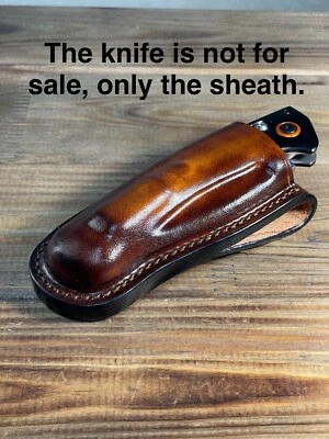 funda moldeada para cuchillo de río torcido hecho en banco Foto 1 de 4