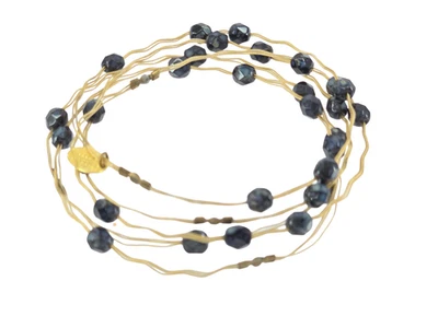 JUEGO DE 5 PULSERAS DE ALAMBRE APILABLES SUSURROS DE TEMPORADA CUENTAS NEGRAS TONO DORADO Foto 1 de 4