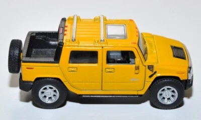 Modellino Kinsmart Hummer H2 SUT Retrocarica Giallo Scala 1:40 - Immagine 1 di 4