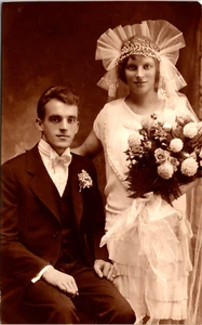 PORTRAIT OF AN ATTRACTIVE WEDDING COUPLE - Picture 1 of 2