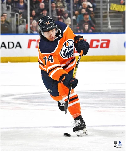 Ethan Bear Edmonton Oilers Unsigned Orange Jersey Shooting Photograph Cover