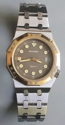 Винтажные редкие швейцарские кварцевые часы Bucherer 555.504 нержавеющая сталь двухцветные - Изображение 1 из 4