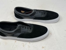 vans era black leather