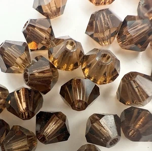 30 x Genuine 4mm 5301 Swarovski Crystal Bicone Beads - Smoked Topaz (Brown) - Picture 1 of 1