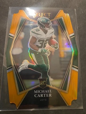 Michael Carter – 2021 NFL Premier Level Orange Prizm Die-Cut RC Serial #153/249 - Image 1 of 2