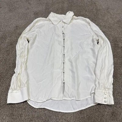 Top con montura marfil abotonada seda manga larga para mujer talla grande” Foto 1 de 4