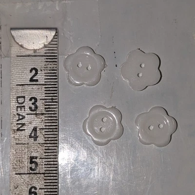 4 14mm White Flower Shaped 2 Hole Plastic Buttons - Image 1 of 2