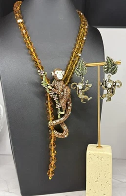 Conjunto de aretes collar cristal mono selva cuentas de vidrio ámbar esmalte estrás Foto 1 de 4