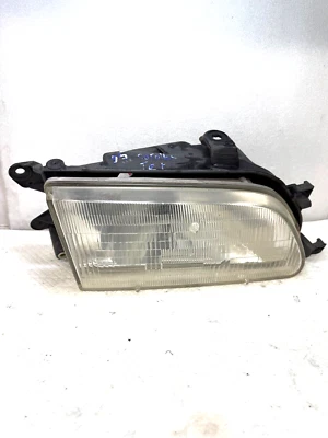 1995 年丰田 Tercel 乘客右侧车头灯 11076087 原始设备制造商 (P10) — 第 1/4 张图片