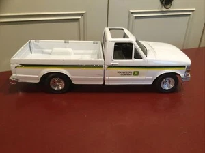 Camioneta pickup ERTL Ford 1/16 John Deere implemento blanca diecast buen estado. - Imagen 1 de 16