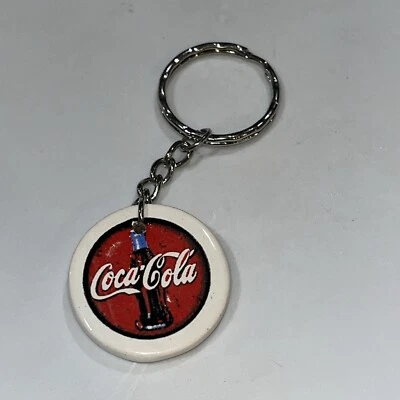 Coca Cola Keychain- Ceramic- Logo On One Side- NWOT- Unusual - Image 1 of 4