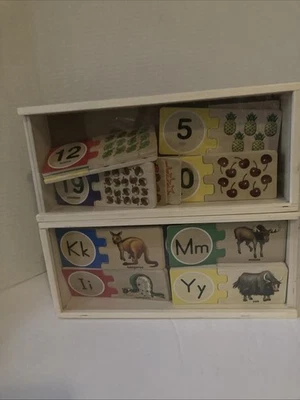 Piezas de rompecabezas de repuesto de número y letra autocorrectoras Melissa & Doug Foto 1 de 2