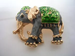 ELEPHANT PENDANT WITH GREEN AND GRAY ENAMEL IN GOLD TONED STAINLESS STEEL - Picture 1 of 6