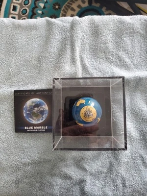 Moneda de plata esférica tierra chapada en oro 24k MÁRMOL AZUL 3 OZ 5$ Barbados 2021 Foto 1 de 4