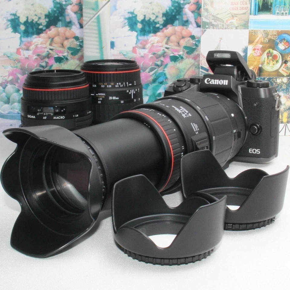 Con batería de repuesto Canon EOS M5 super teleobjetivo triple zoom Foto 1 de 4