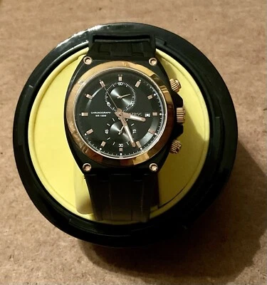 Reloj cronógrafo TAYROC 42mm todo inoxidable negro/dorado para hombre funciona muy bien Foto 1 de 4