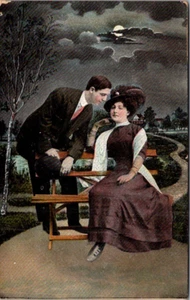 Man Leaning into Woman on Bench night view ROMANCE Postcard - Picture 1 of 2