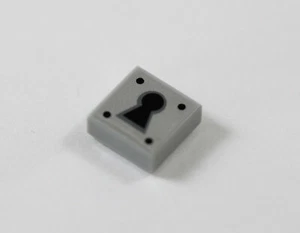 LEGO® Light Gray Tile 1 x 1 with Keyhole Pattern - Picture 1 of 6
