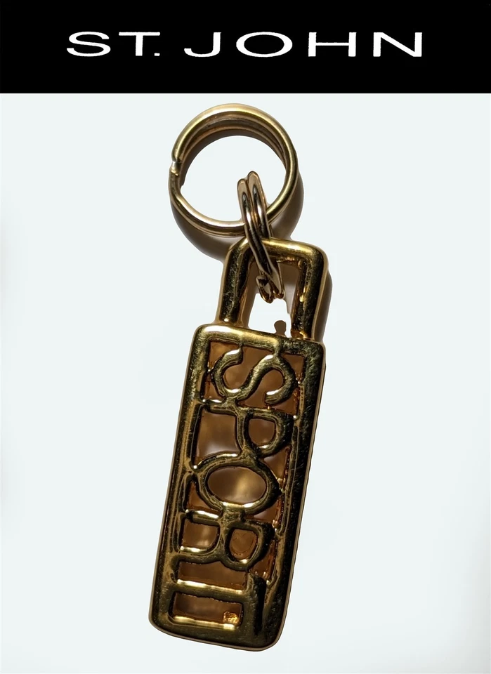 St John вязаный спортивный шрифт для Хэллоуина золотистый логотип застежка-молния/кулон - Изображение 1 из 1
