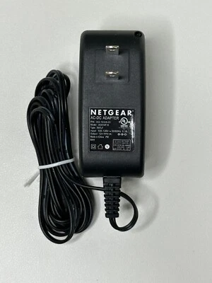 AC/DC Adapter For NetGear P/N: 332-10329-01 Model AD810F10 Type: 0007LF 12V DC - Image 1 of 3