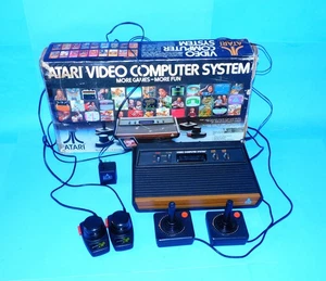 ATARI 2600 VIDEO ENTERTAINMENT SYSTEM w/ BOX, JOYSTICKS, PADDLES AS IS UNTESTED - Picture 1 of 14
