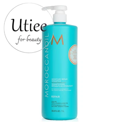 Champú reparador de humedad Moroccanoil 33,8 fl oz para cabello dañado Foto 1 de 3