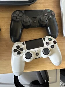 Playstation Dualshock 4 Controller 1weiß 1schwarz für Ersatzteile - Bild 1 von 6