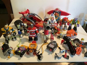 Vintage Fisher Price Rescue Heroes Lot Figures Backpacks Vehicles Lot #1 - Bild 1 von 13