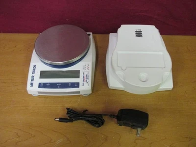 Balanza de precisión Mettler Toledo PL6001E 6200G capacidad máxima con cubierta y cable de alimentación Foto 1 de 4