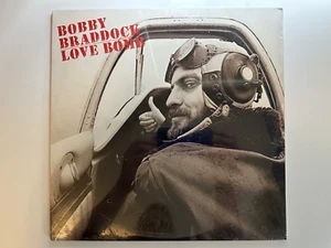 BOBBY BRADDOCK - LOVE BOMB (VINY LP RECORD) - NEW/SEALED - Picture 1 of 2