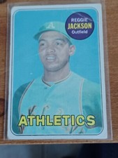 Reggie Jackson Topps 1969 Rookie Card #260 with creases