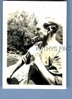 Found B&W Photo H+7514 Man From Side Smoking Cigarette On Boat