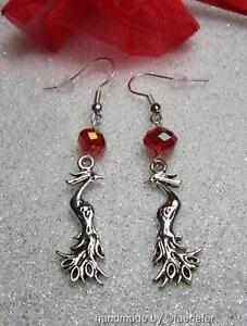 Phoenix Earrings with red crystal silver plated wires mythical fantasy jewellery