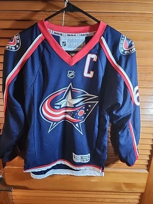 Camiseta deportiva de hockey REEBOK Rick Nash #61 Columbus Blue talla juvenil pequeña mediana Foto 1 de 4