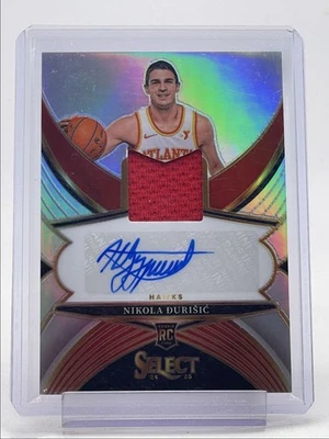 NIKOLA DURISIC 2024-25 SELECT RPA ROOKIE SILVER PRIZM PATCH RC AUTO /199 Q4856 - Image 1 of 2