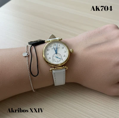 Reloj suizo de cuarzo blanco Akribos XXIV para mujer AK704 Foto 1 de 4