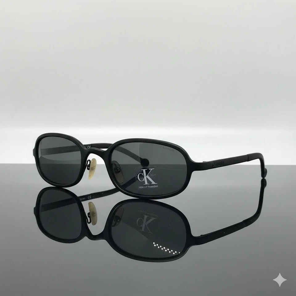 VINTAGE  CALVIN KLEIN CK  RARITY Sunglasses  CK2014 col.6B Metal Fr. Grey Lenses Foto 1 de 2