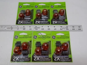 (12) New GE 3157NALL Miniature Lamp Bulb 27w 8w Plastic Wedge 12 volt S8 - Picture 1 of 6