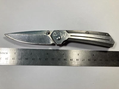 Cuchillo de bloqueo de marco Buck 242 de acero inoxidable y negro Foto 1 de 3