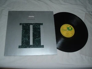 AXXIS II '90 ORIGINAL GERMAN 1st press LP DIE-CUT cover NMint - Imagen 1 de 4