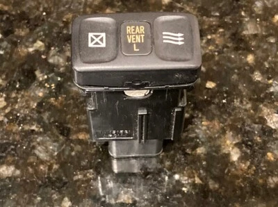 Toyota Land Cruiser 1998-2007 conductor izquierdo cuarto trasero ventilación cristal interruptor OEM Foto 1 de 4